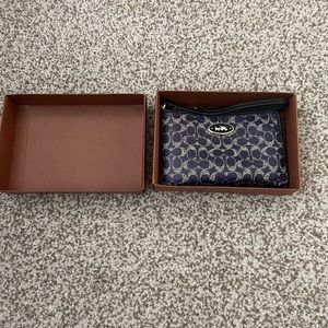 Purple coach wristlet